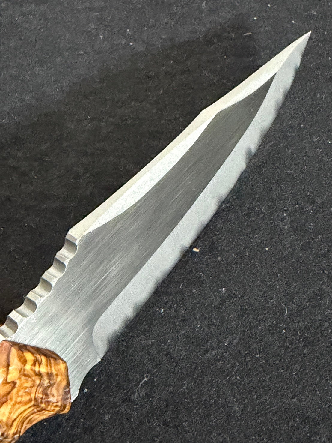 Hand-ground blade edge detail on Mononofu tactical knife